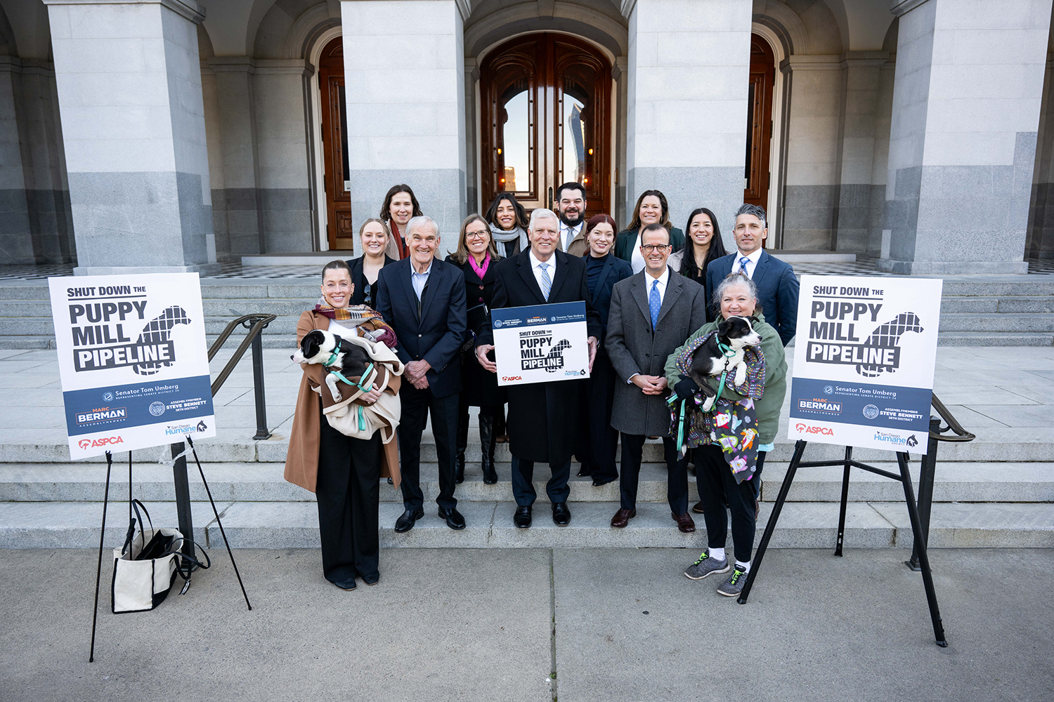 Figure 2 - Assemblymember Bennett with legislators, staff, and bill package sponsors.