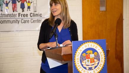 Guest speaker at podium, speaking