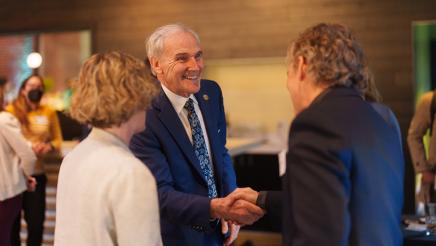 Asm. Bennett shaking hands with attendees