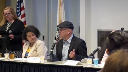 Geoff Green (center) of CalNonprofits speaking