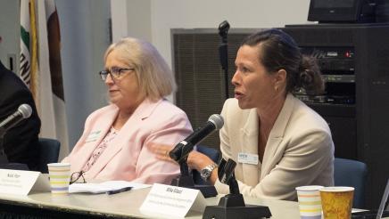 Nicki Parr (right) of Women's Economic Ventures speaking