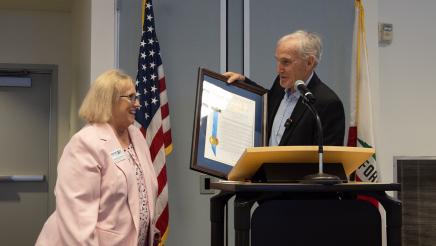 Asm. Bennett (right) presenting Resolution to Linda Braunschweiger of Housing Trust Fund of Ventura County