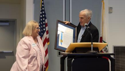 Asm. Bennett (right) presenting Resolution to Linda Braunschweiger of Housing Trust Fund of Ventura County