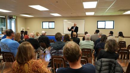 Assemblymember Bennett provides opening remarks to attendees