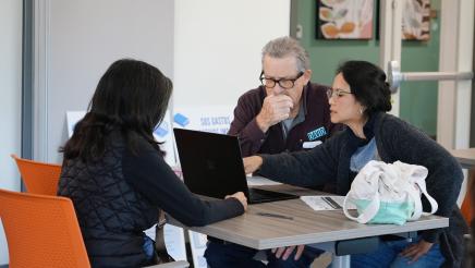 Volunteers assisting constituents with their tax documents