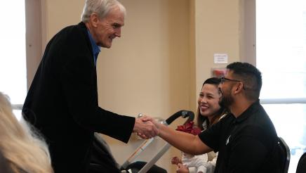 Asm. Bennett greets Daniel Gonzalez from Future Leaders of America and his famil