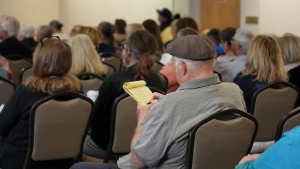 Attendee handwriting notes.