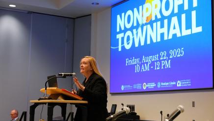 Dena Jenson of CalLutheran Center for Nonprofit Leadership commences the program.