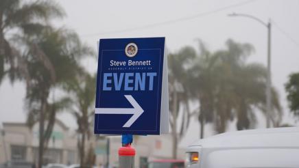 Signage from Asm. Bennett’s office points to event location at Perkins Road.  