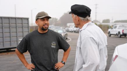 Rafael Ochoa of Coastal Keepers (left) speaks with Asm. Bennett
