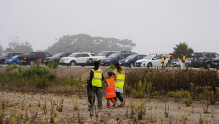 Young students go out to pick up trash