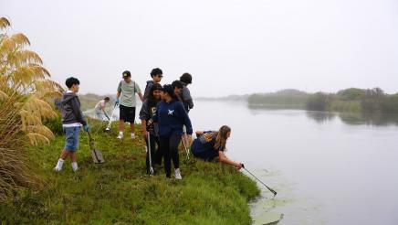 Mesa Union students attempt to grab trash from river 
